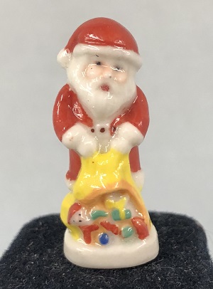(image for) Santa pouring out toys from bag - Click Image to Close